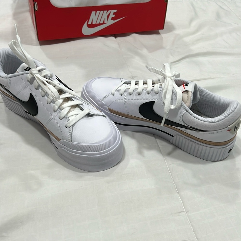 Women’s Nike court legacy fit. White. Brand new in box. Size 10. Never worn.
